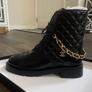 Rep of Chanel calfskin quilted lace up combat boots with detachable chains.